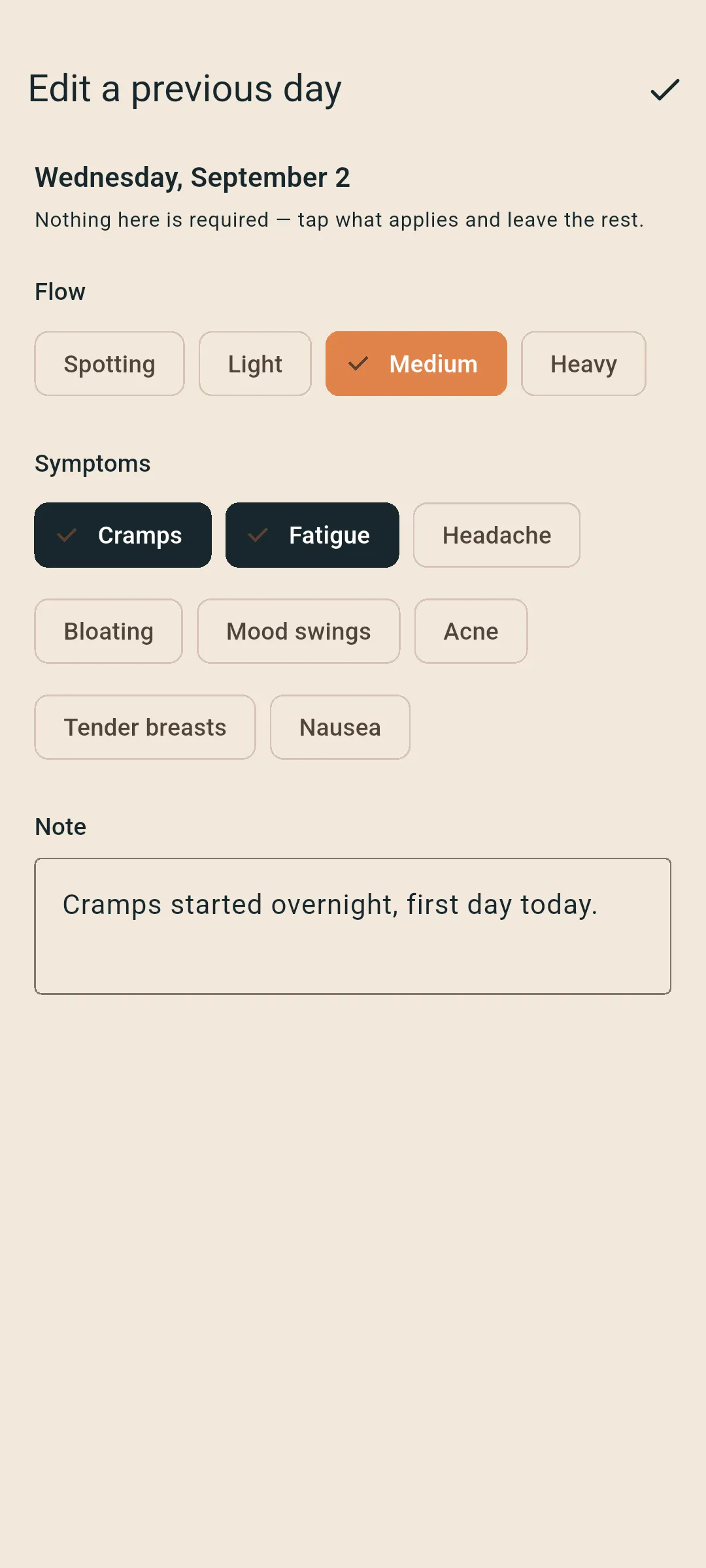 Logging a day with flow set to medium, cramps and fatigue selected, and a short note